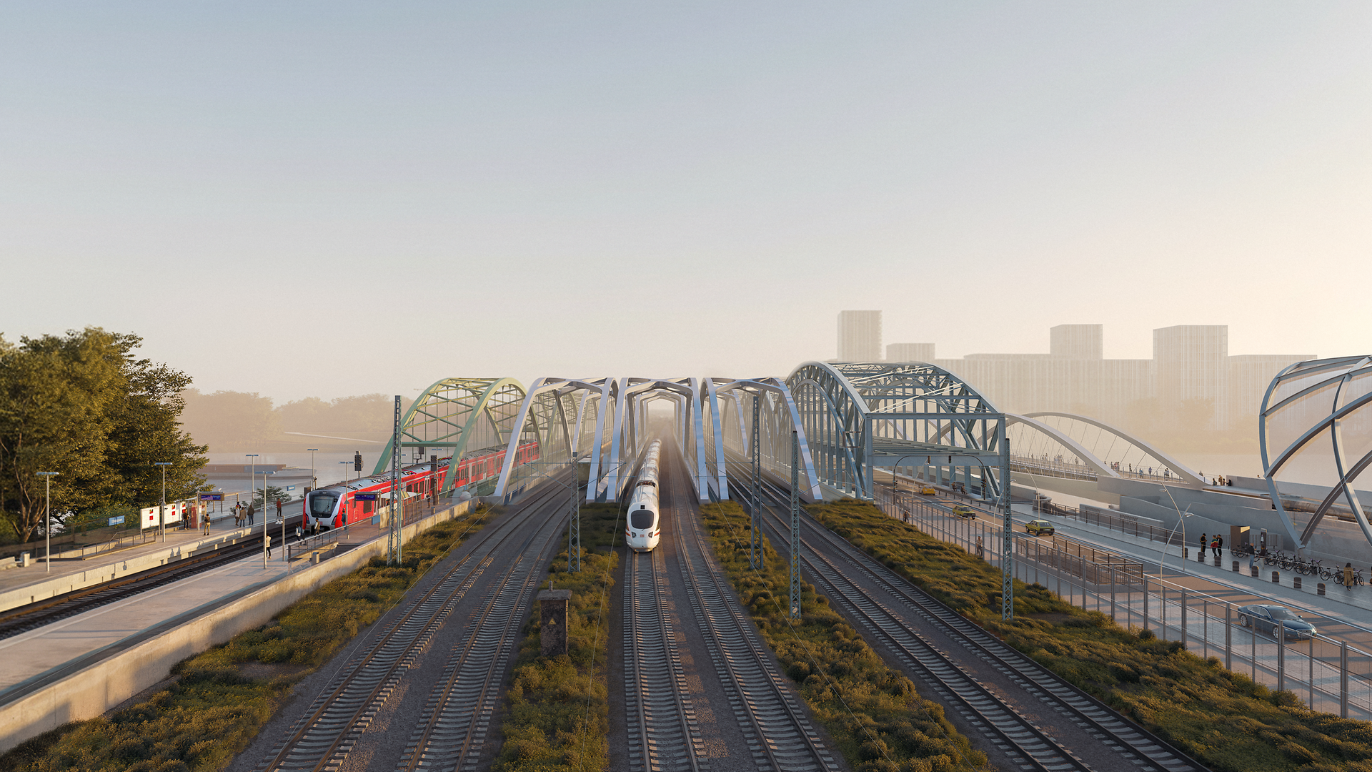 Der Blick über die neuen Eisenbahnbrücken (2. bis 4. v.l.) über die Norderelbe