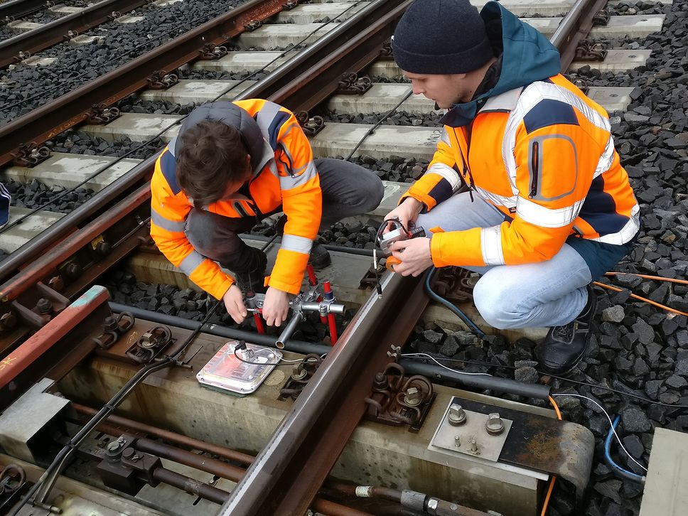 The sensor measures ballast displacement.