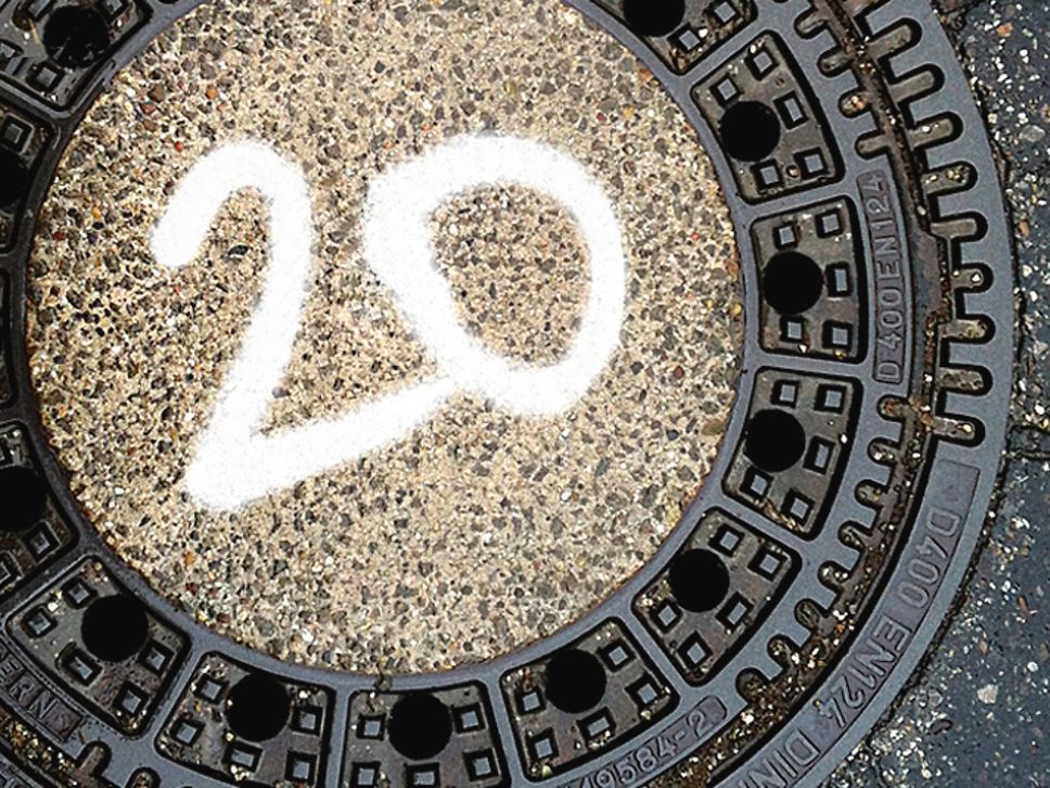 Gully cover with the number 20 on it